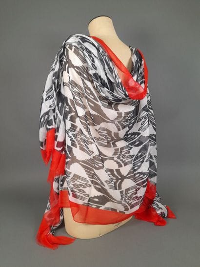 OSCAR DE LA RENTA.
Fringed stole in modal...