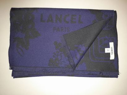 LANCEL, PARIS.
Fringed wool scarf decorated...