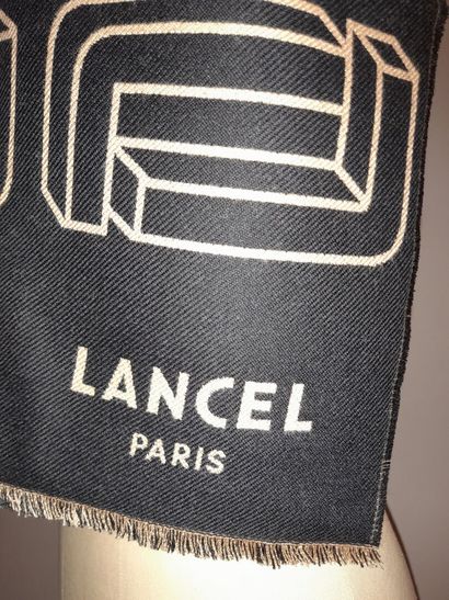 LANCEL, PARIS.
Fringed wool scarf decorated...