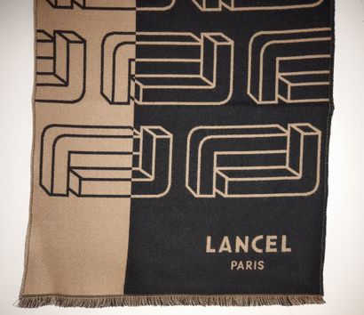 LANCEL, PARIS.
Fringed wool scarf decorated...