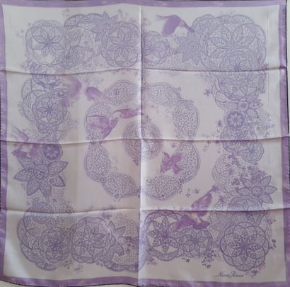 NINA RICCI.
Silk twill square decorated with...