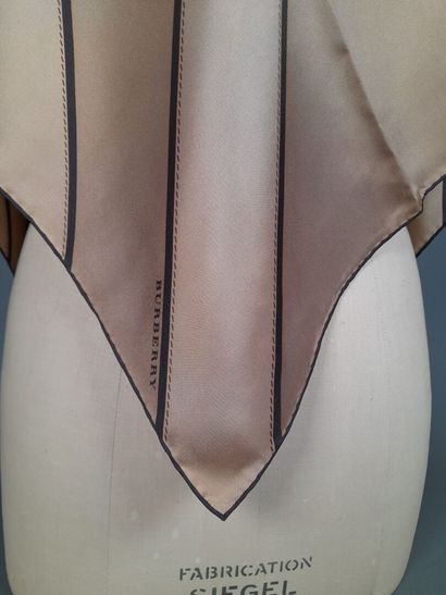 BURBERRY.
Silk twill square decorated with...
