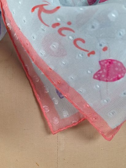 NINA RICCI.
Shaped silk square decorated...