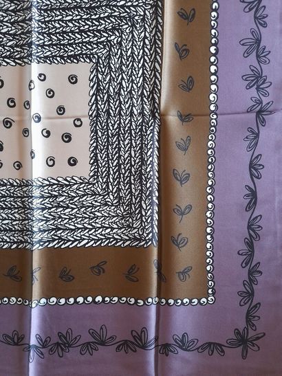 Lot including: 
-NODUS.
Woolen scarf with...