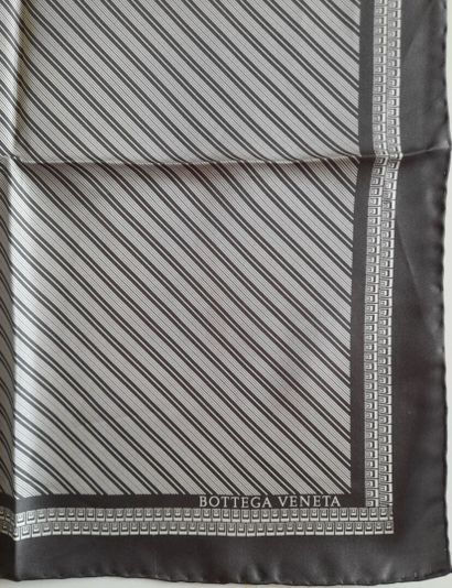 Lot including:
- MONCLER.
Silk twill square...