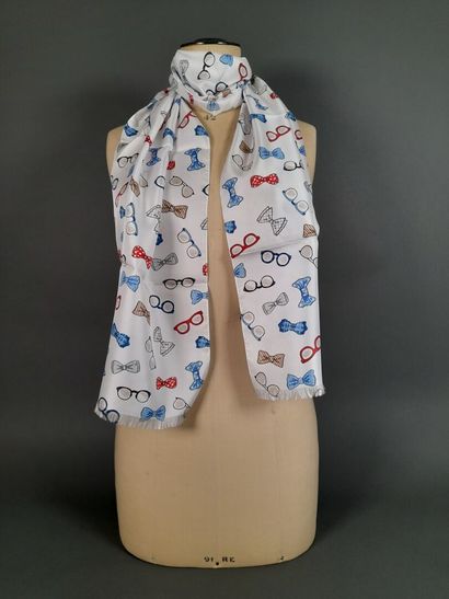 Lot including:
- Silk twill fringed scarf...