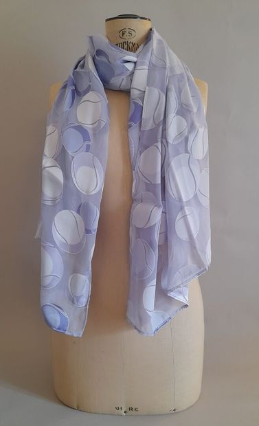 Lot including:
- COACH.
Fringed cotton square...