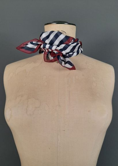 NINA RICCI.
Set of two cotton squares decorated...