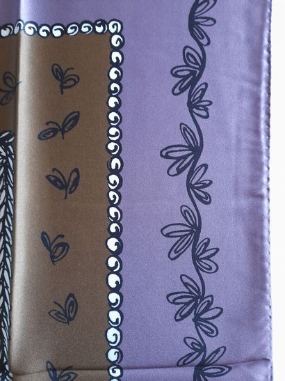 Lot including: 
-NODUS.
Woolen scarf with...