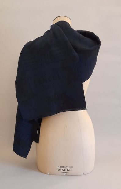 LANCEL, PARIS.
Fringed wool scarf decorated...