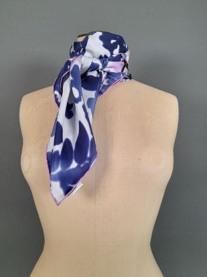 NINA RICCI.
Silk twill square decorated with...