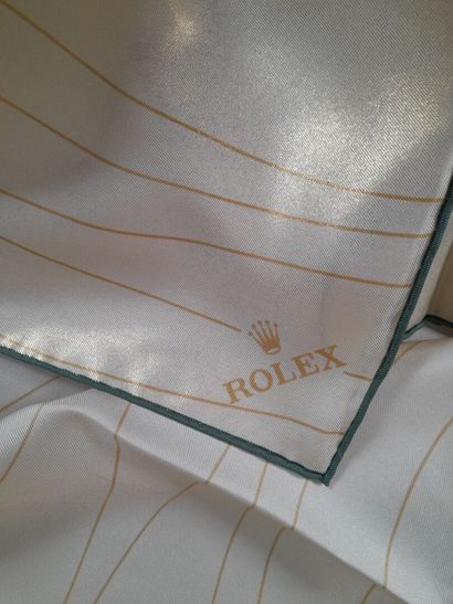ROLEX.
Carré en twill de soie à décor de...