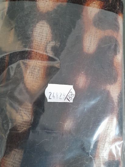 CHRISTIAN DIOR.
Echarpe frangée en mohair,...