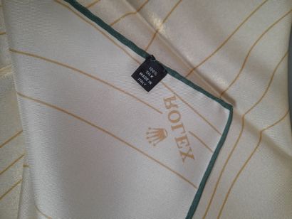 ROLEX.
Carré en twill de soie à décor de...