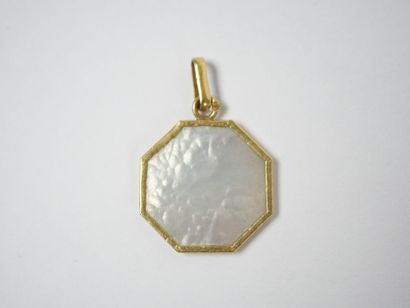 Octagonal religious medal in 18K yellow gold...