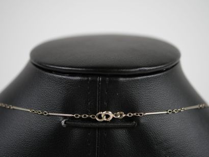 Necklace in 18K white gold adorned with 9...