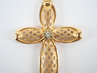 Stylized cross-pendant in 18K yellow gold...