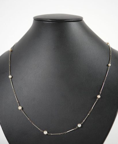 Necklace in 18K white gold adorned with 9...
