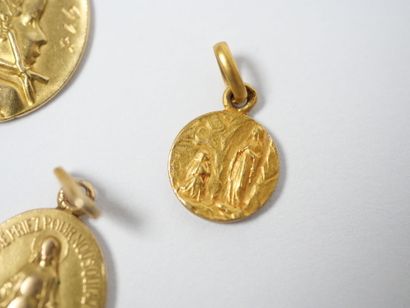 Set of five religious medals in 18K yellow...