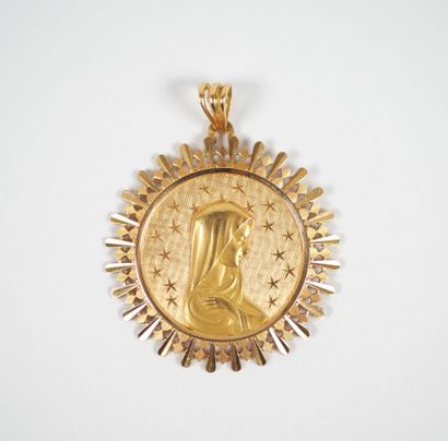 Circular religious medal in 18K yellow gold...