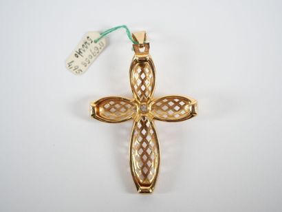 Stylized cross-pendant in 18K yellow gold...