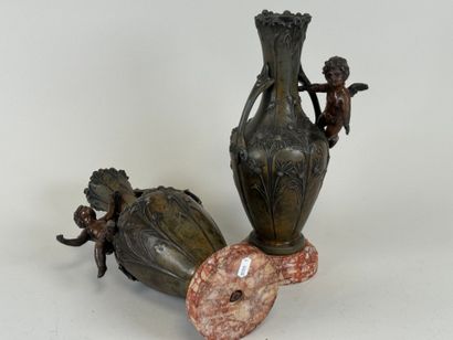 Paire de vases en régule à décor feuillagé...