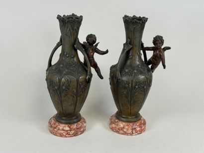 Paire de vases en régule à décor feuillagé...
