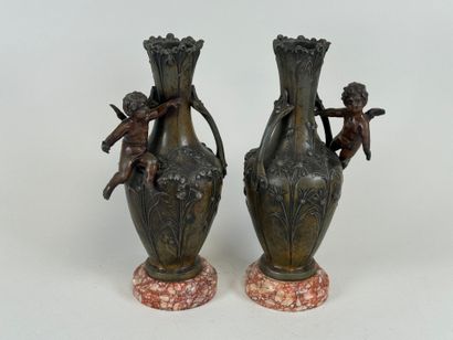 Paire de vases en régule à décor feuillagé...