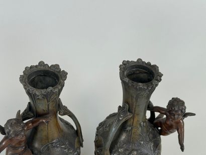 Paire de vases en régule à décor feuillagé...