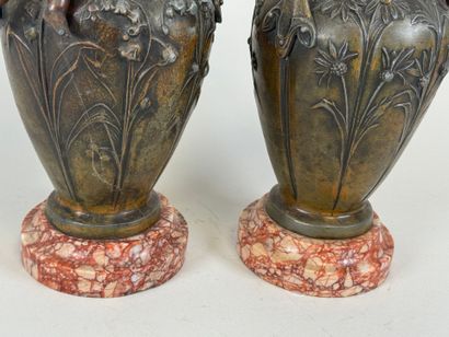 Paire de vases en régule à décor feuillagé...