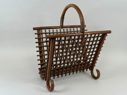 Porte-revues en osier et bois courbé.
55...