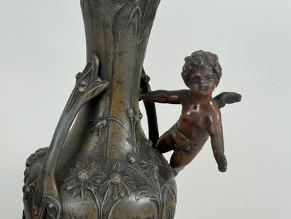 Paire de vases en régule à décor feuillagé...