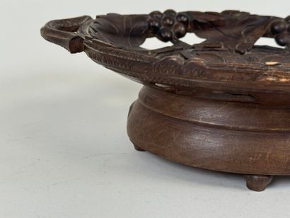 Coupe vide-poche musical en bois sculpté...