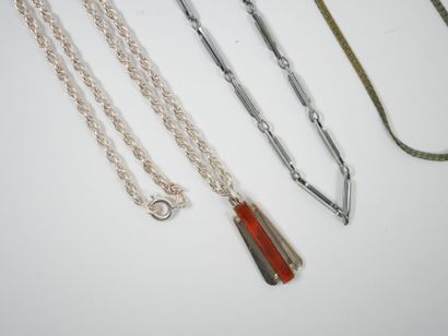 Lot of metal and silver costume jewelry including...