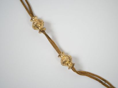 Gilt metal chatelaine adorned with a watch...