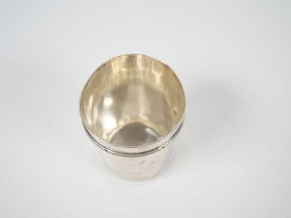 Minerve silver tumbler with ribboned rushes...