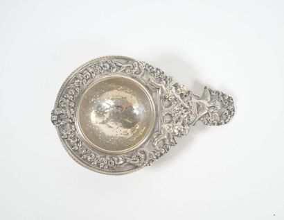 Foreign silver tea-pot decorated with cherubs...