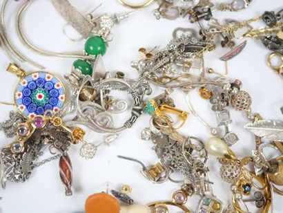 Lot of metal and silver costume jewelry including...