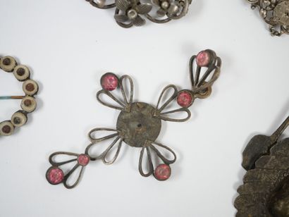 Lot of metal costume jewelry including mechanical...