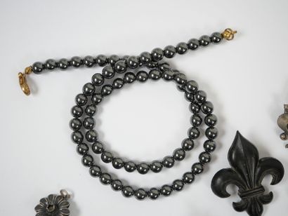 Lot of metal costume jewelry including mechanical...