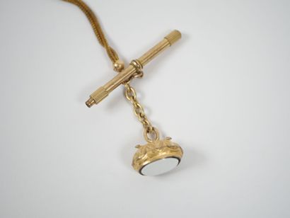 Gilt metal chatelaine adorned with a watch...