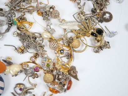 Lot of metal and silver costume jewelry including...