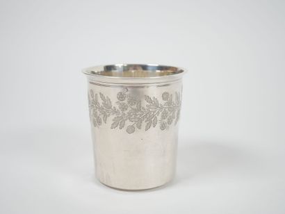 A Minerve-cut silver tumbler with chased...