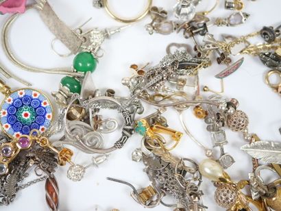 Lot of metal and silver costume jewelry including...
