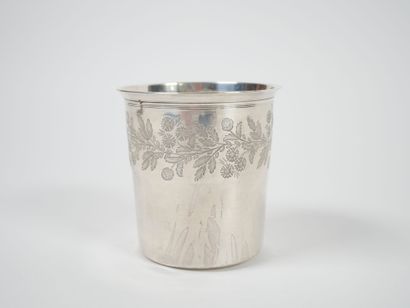 A Minerve-cut silver tumbler with chased...