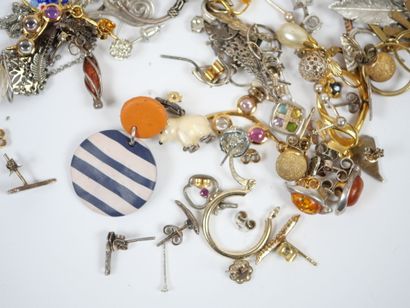 Lot of metal and silver costume jewelry including...