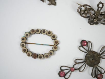 Lot of metal costume jewelry including mechanical...