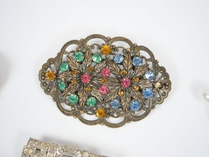 Set of 11 fancy metal and gilded metal brooches...