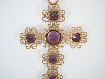 Set in openwork gilt metal adorned with crimped...