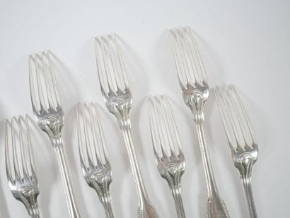Set of eight silver forks and four silver...